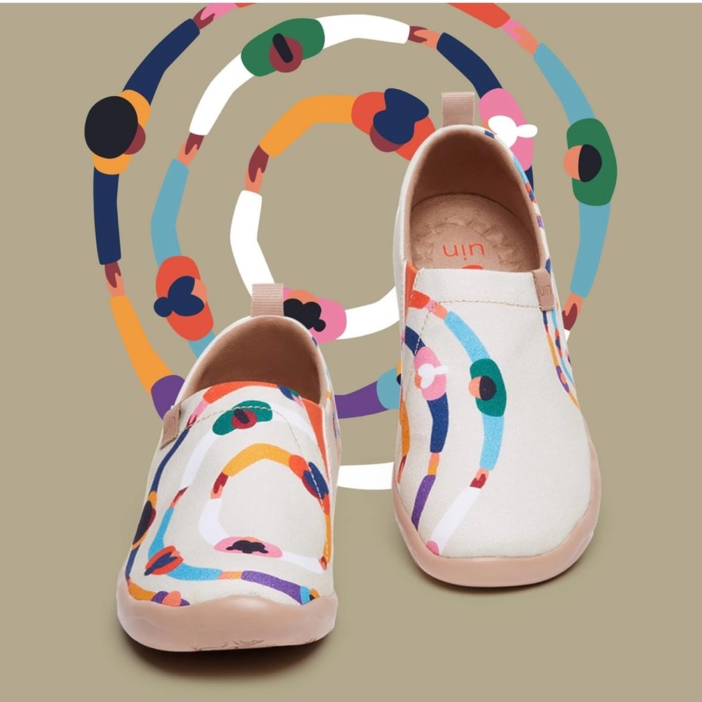 UIN NWT size 9.5 Love circle canvas slip on. Retails $85 on website